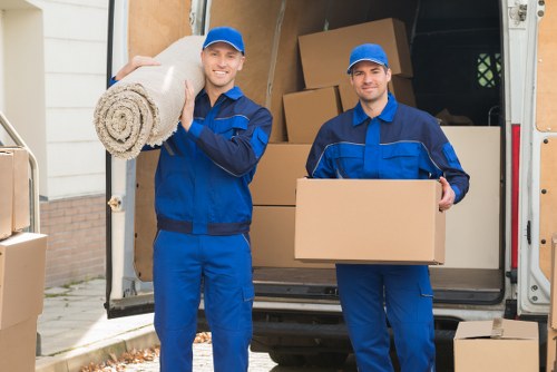 Professional house removals in Coulsdon with packed boxes ready for loading