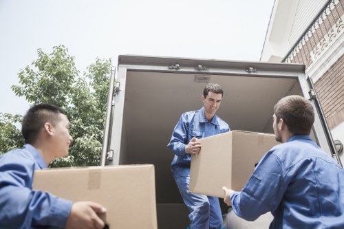 Packing tape, labels, and boxes arranged for a Coulsdon packing service
