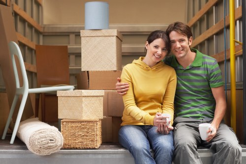 Local team collecting a sofa and chair for furniture pick-up in Coulsdon