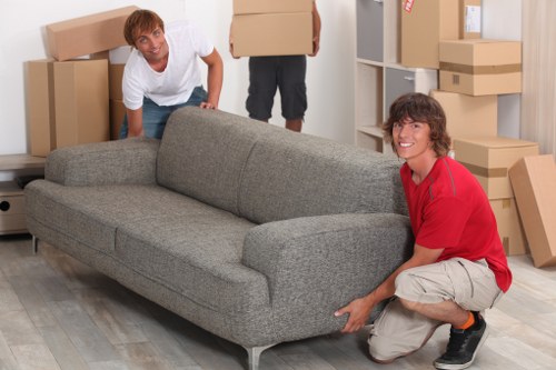 Local office move preparation showing labelled equipment and careful loading in Coulsdon